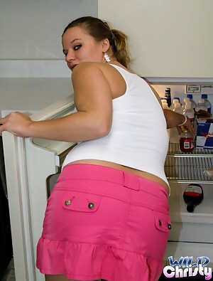 Ponytailed scrumptious teen babe Christy showing her vast hooters in the kitchen
